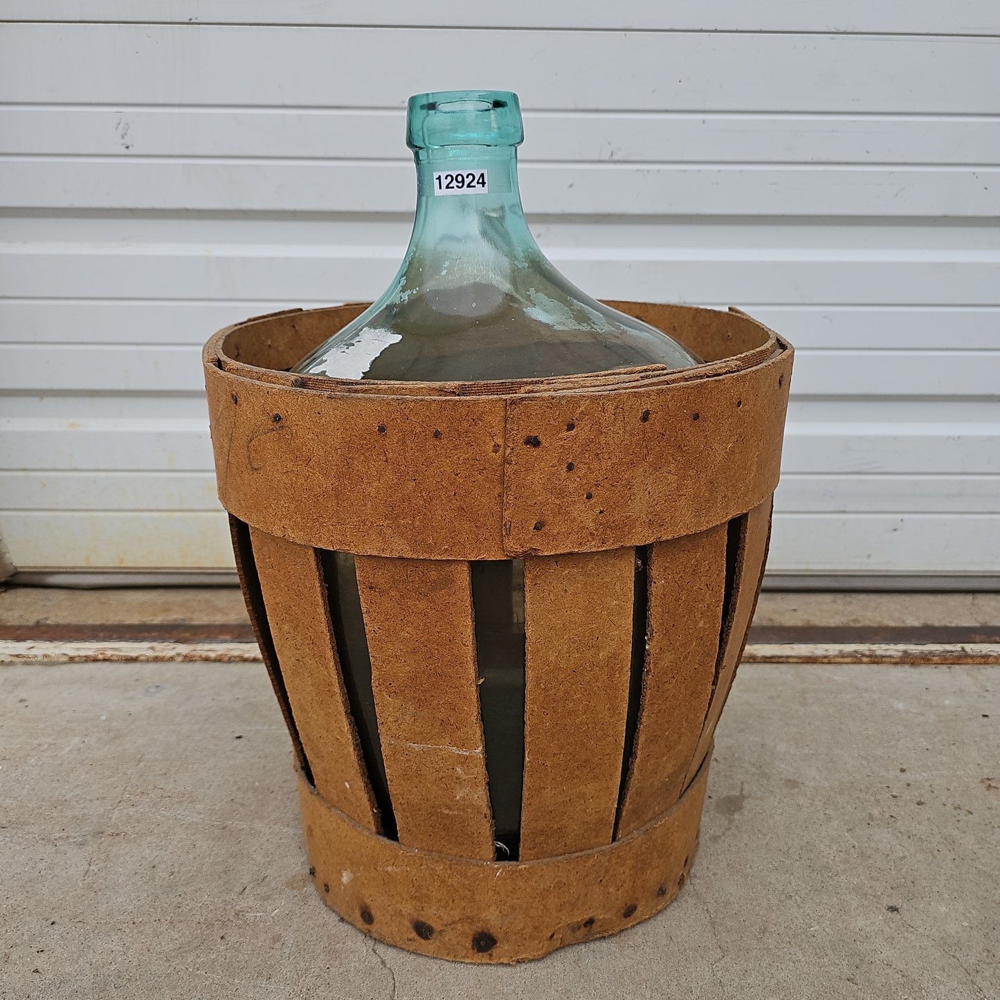 Demijohn in Basket