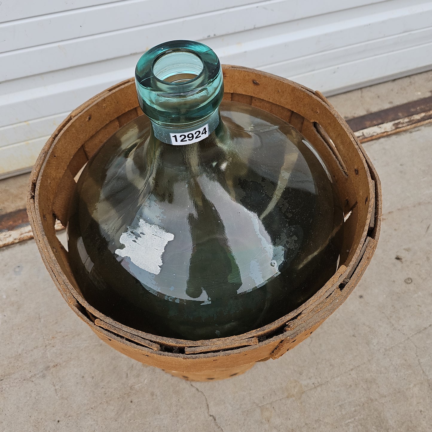 Demijohn in Basket