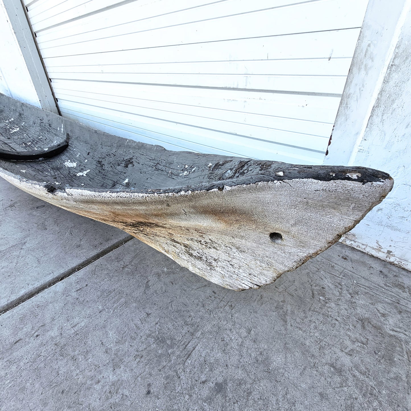 Early Wooden Canoe on Stands