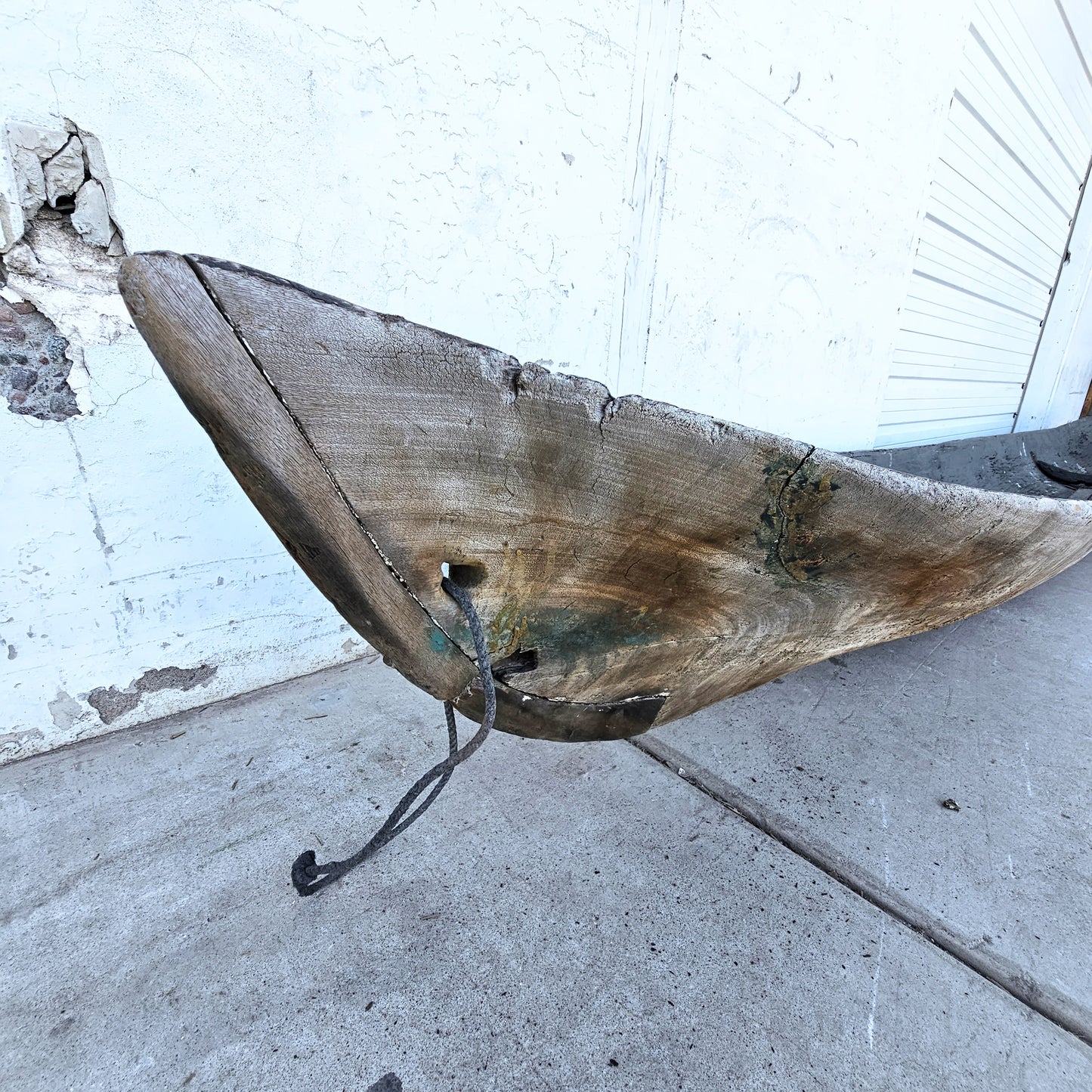 Early Wooden Canoe on Stands