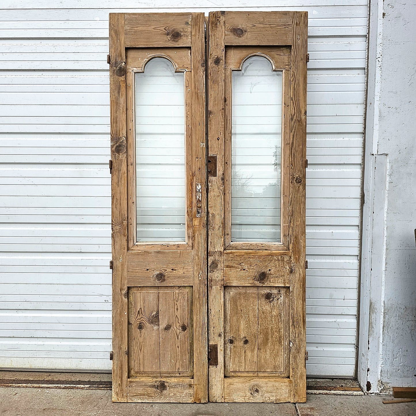 Pair of Carved Wood Doors w/2 Single Glass Lites