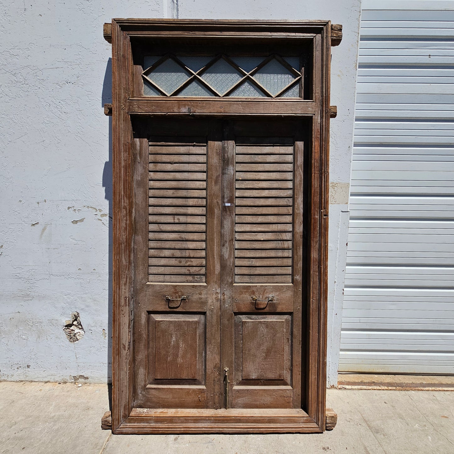 Pair of Wood Shuttered Doors with Glass Transom in Frame
