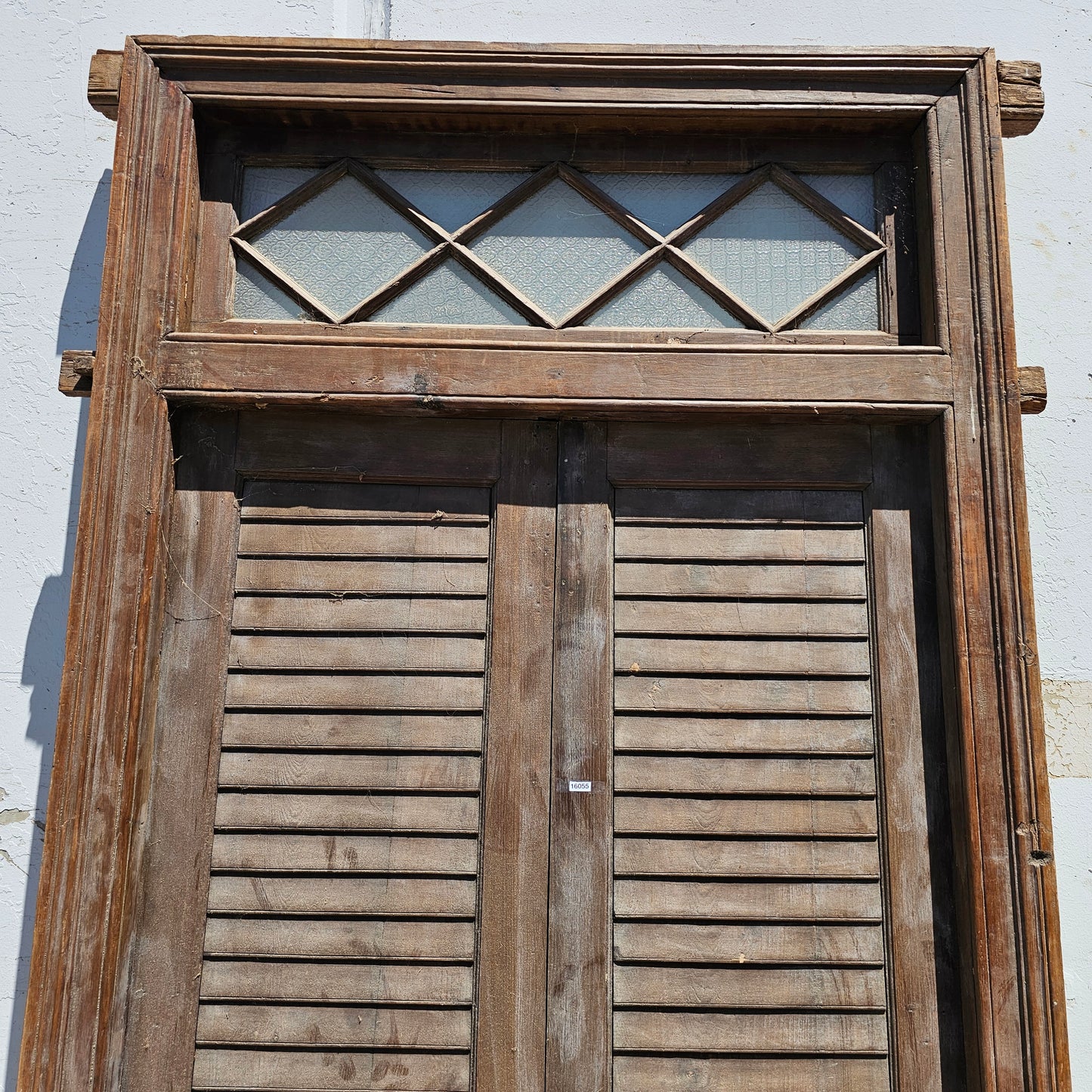 Pair of Wood Shuttered Doors with Glass Transom in Frame