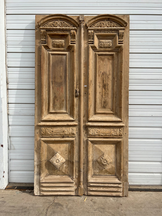 Pair of Carved Wood Panel Doors