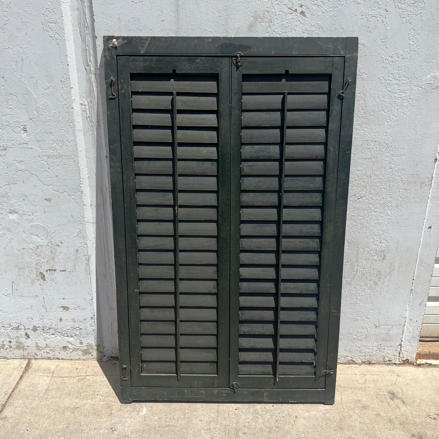 Set of Dark Green Shutters on Hinges