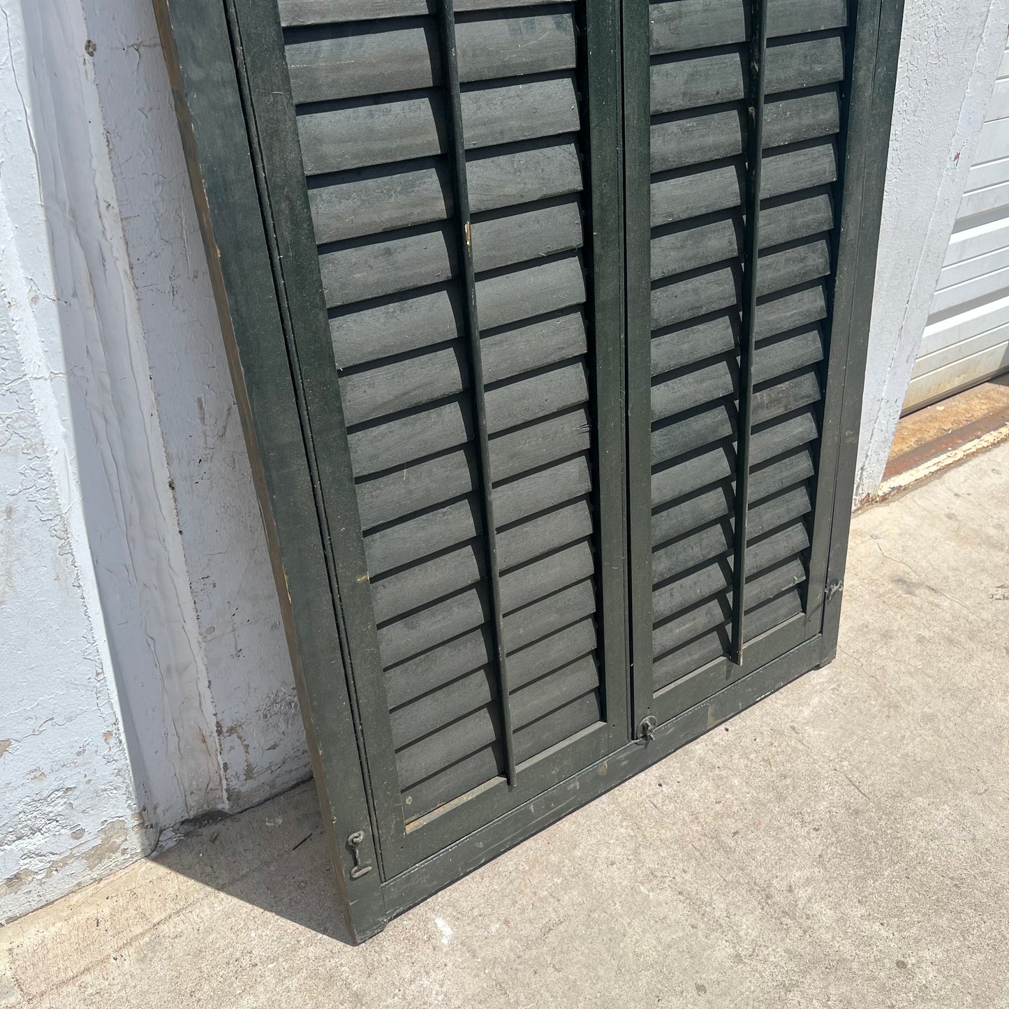 Set of Dark Green Shutters on Hinges