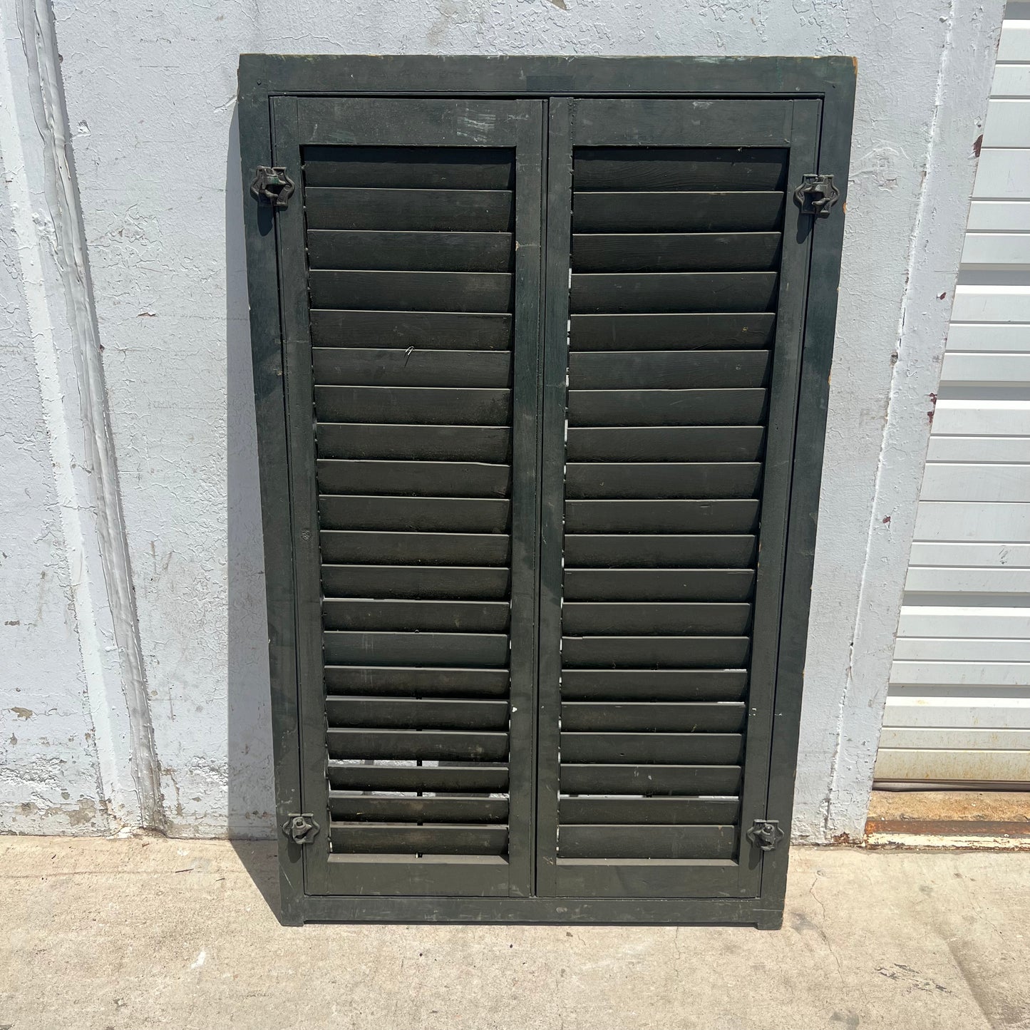 Set of Dark Green Shutters on Hinges