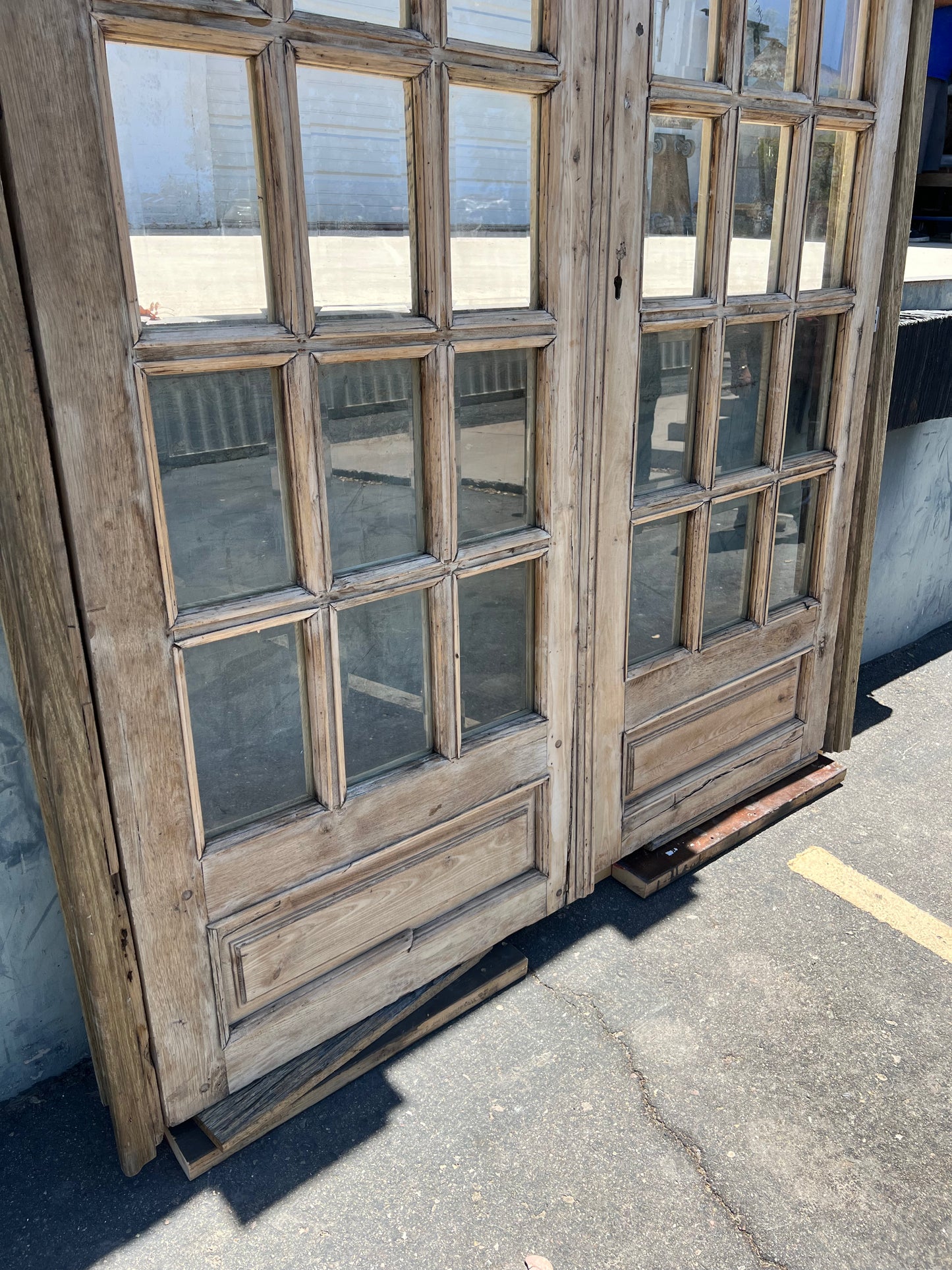 Pair of Arched Carved Wood Doors