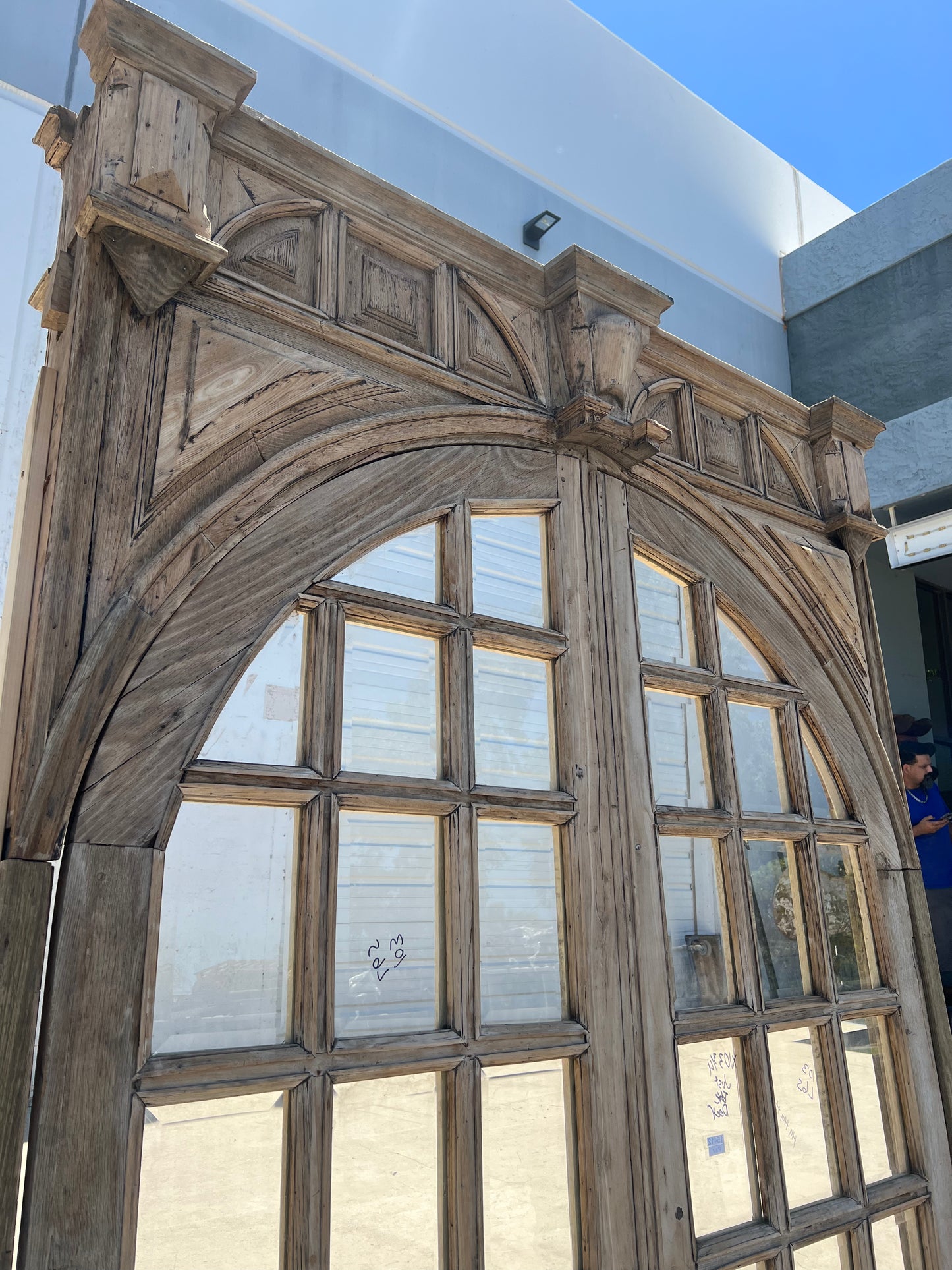 Pair of Arched Carved Wood Doors