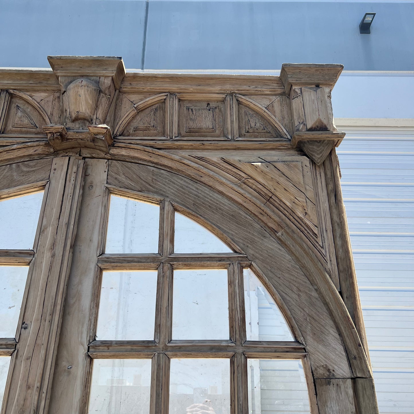 Pair of Arched Carved Wood Doors