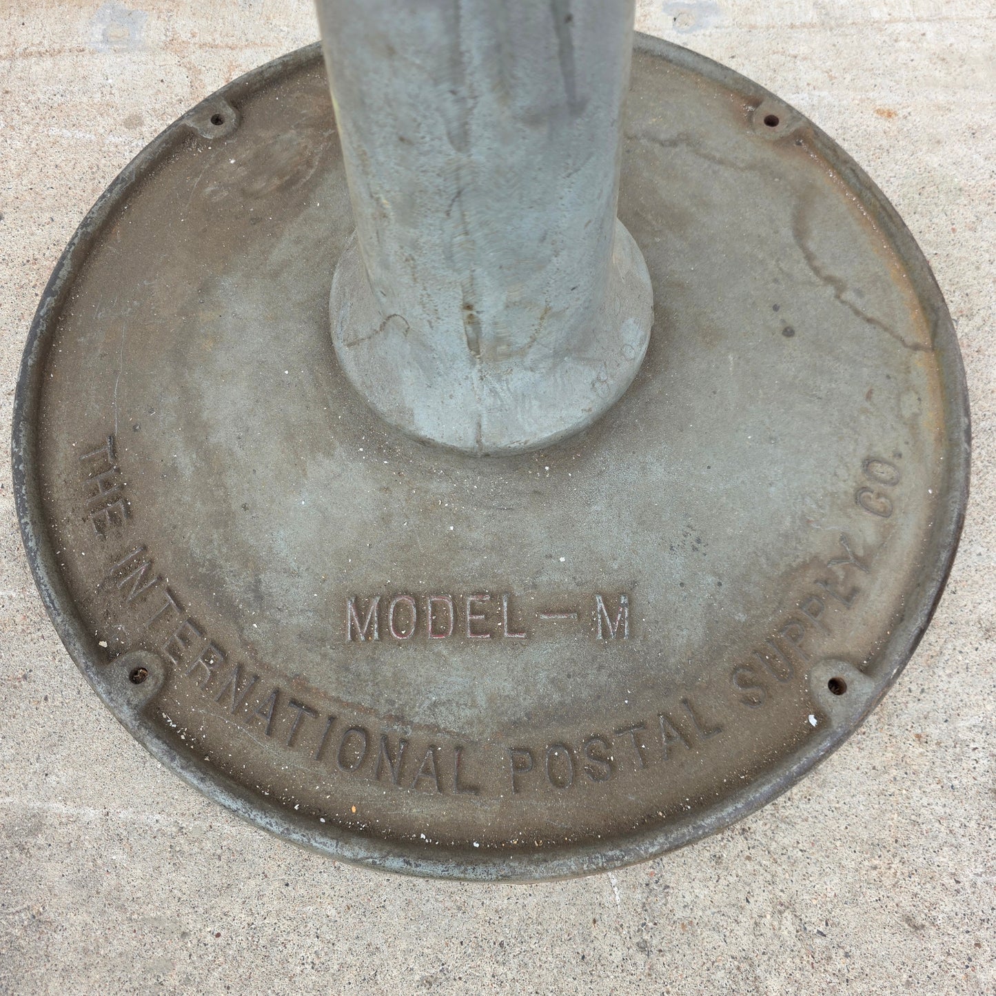 "The International Postal Supply Co." Stand (industrial salvage)