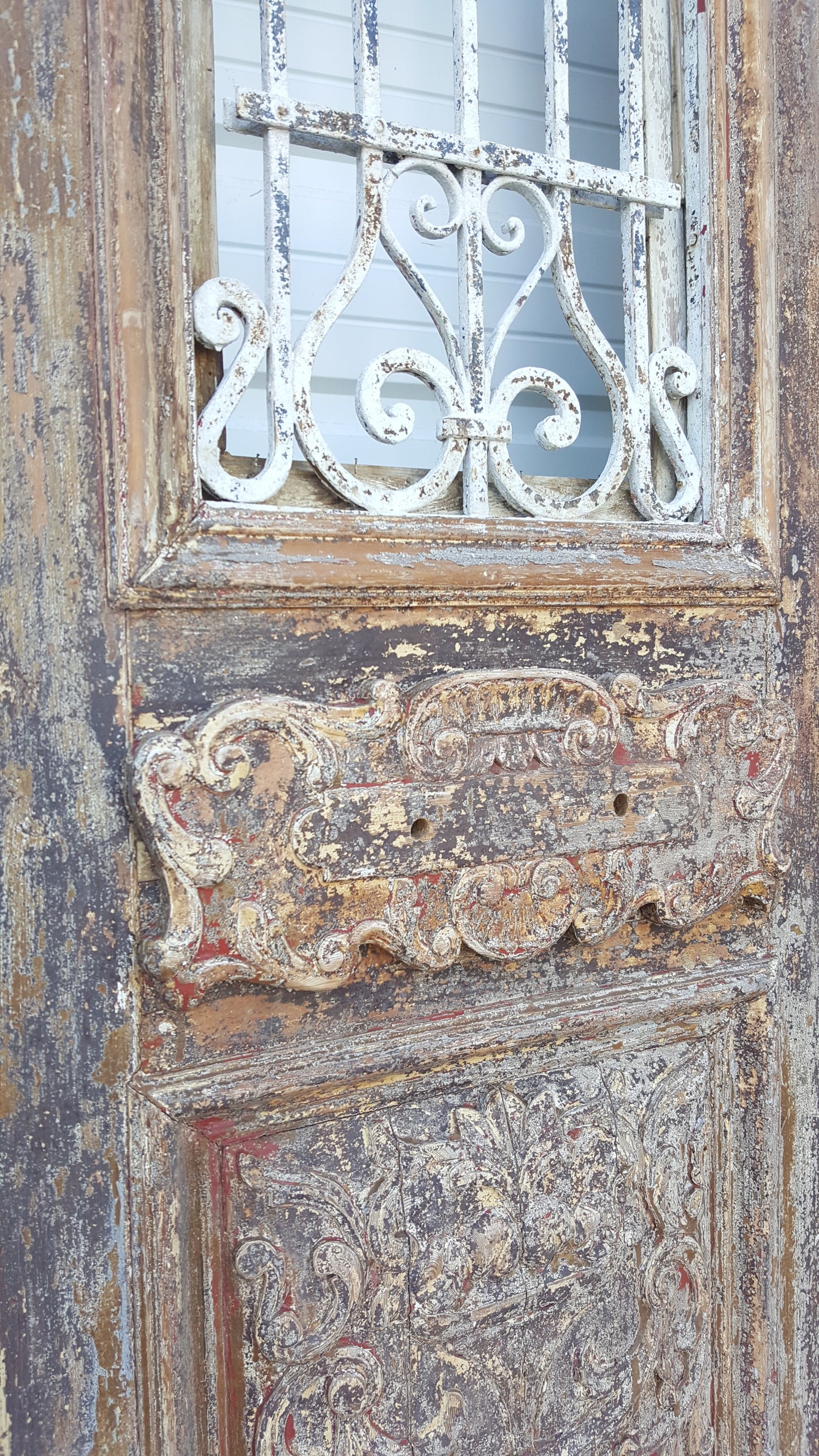 Pair of 3 Panel Carved Antique Doors with Iron Inserts