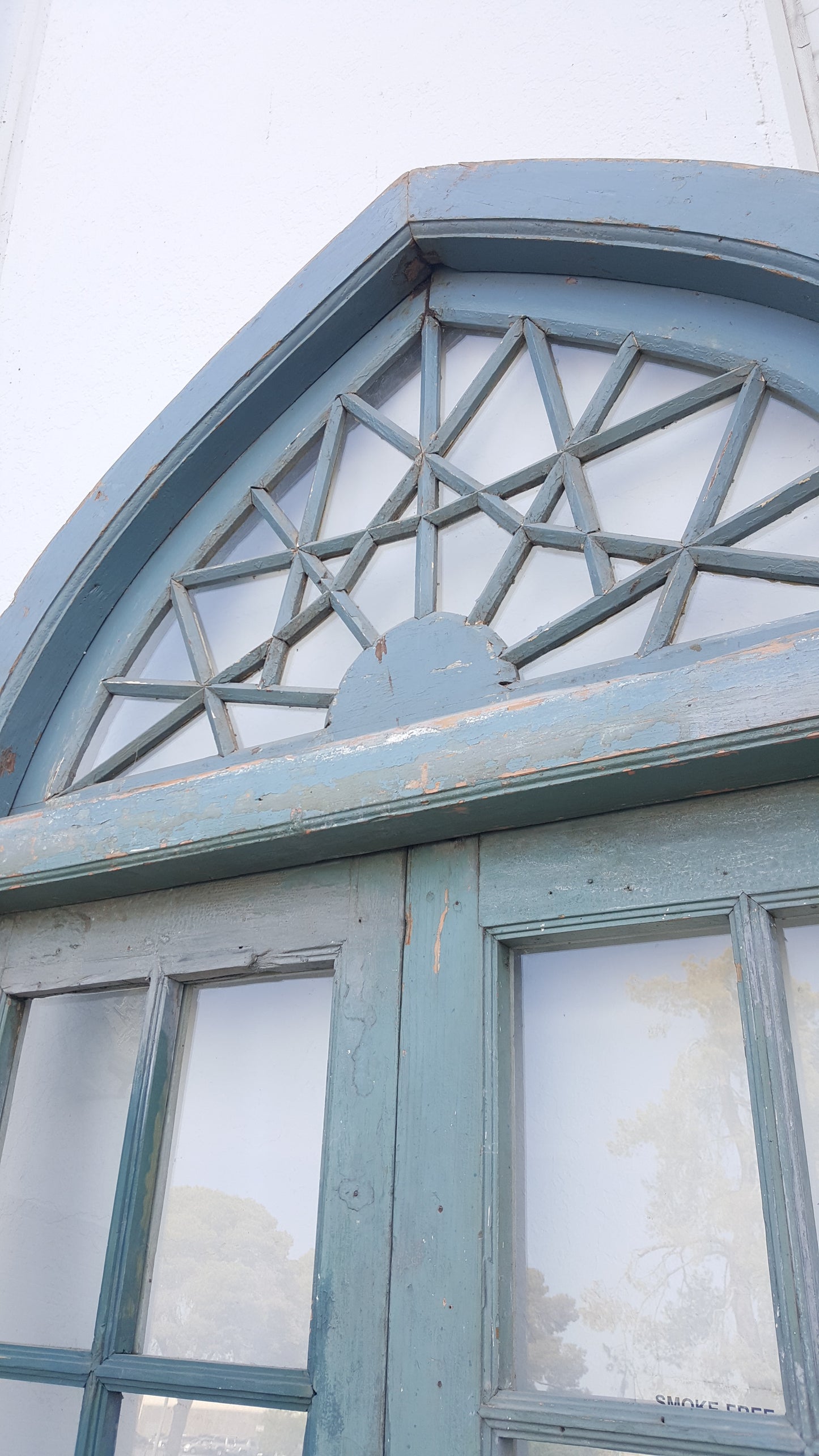 Pair of 2 Panel 6 Lite Blue Antique Doors with Spiderweb Transom
