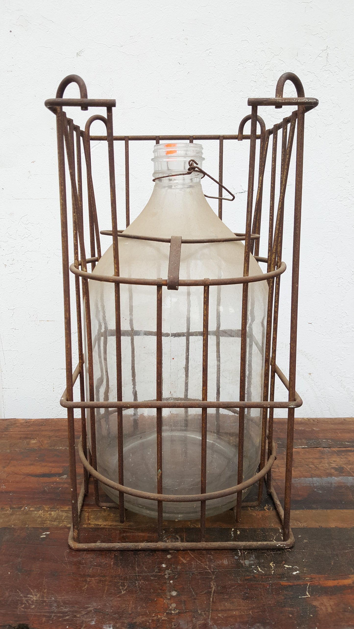 Antique Clear Bottle in Metal Crate