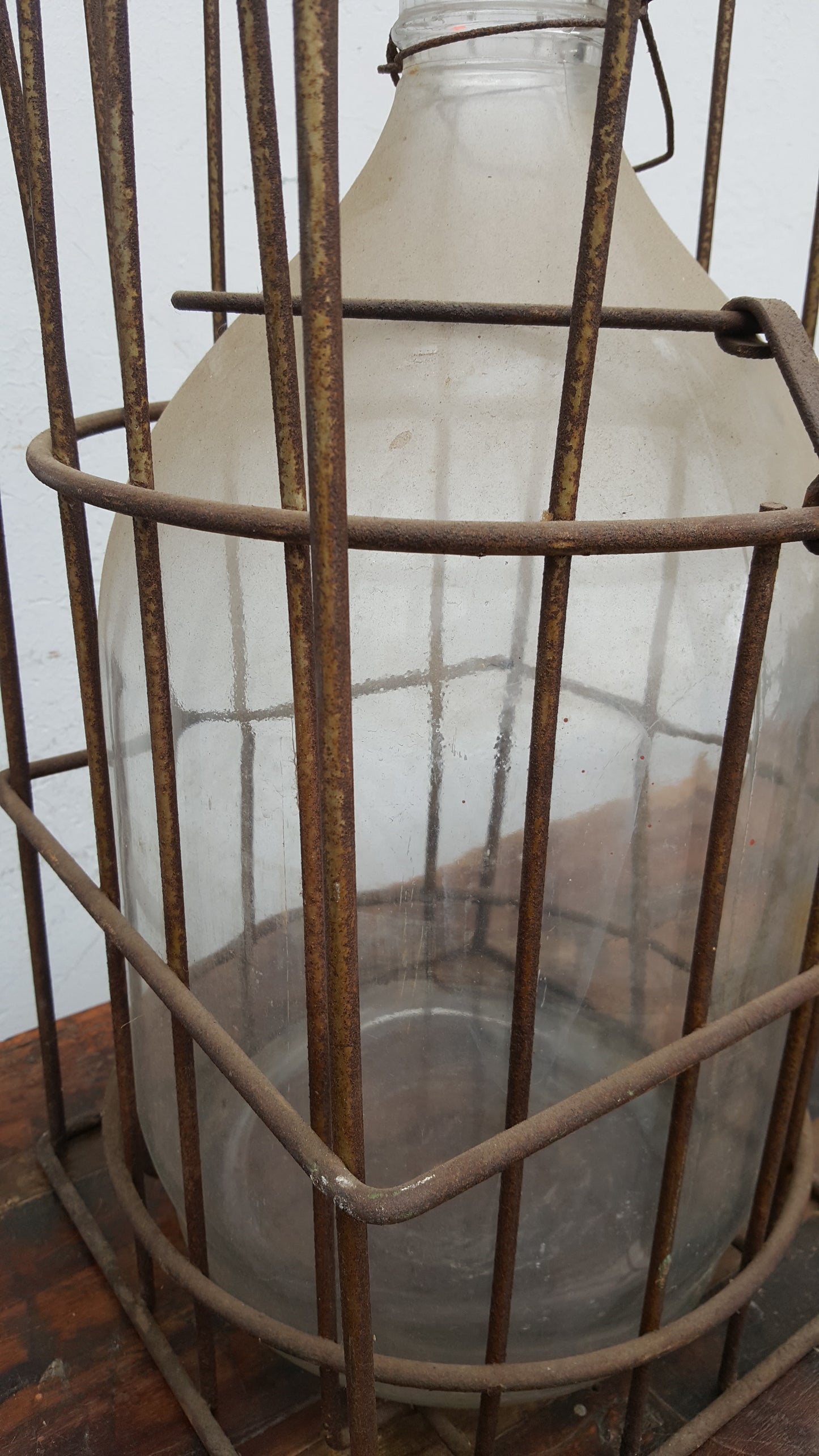 Antique Clear Bottle in Metal Crate