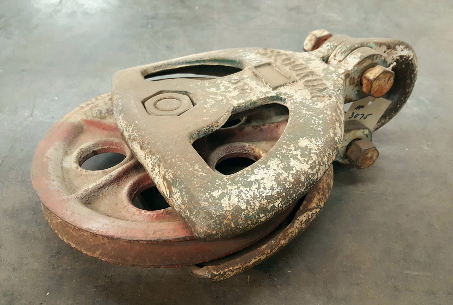 Pulley, white paint, iron