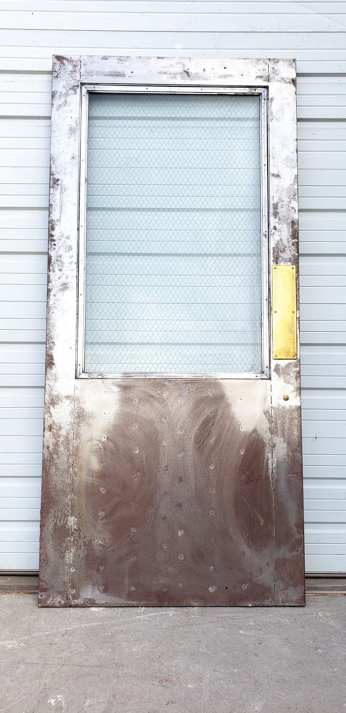 Oversized Single Metal Door with Chicken Wire Glass
