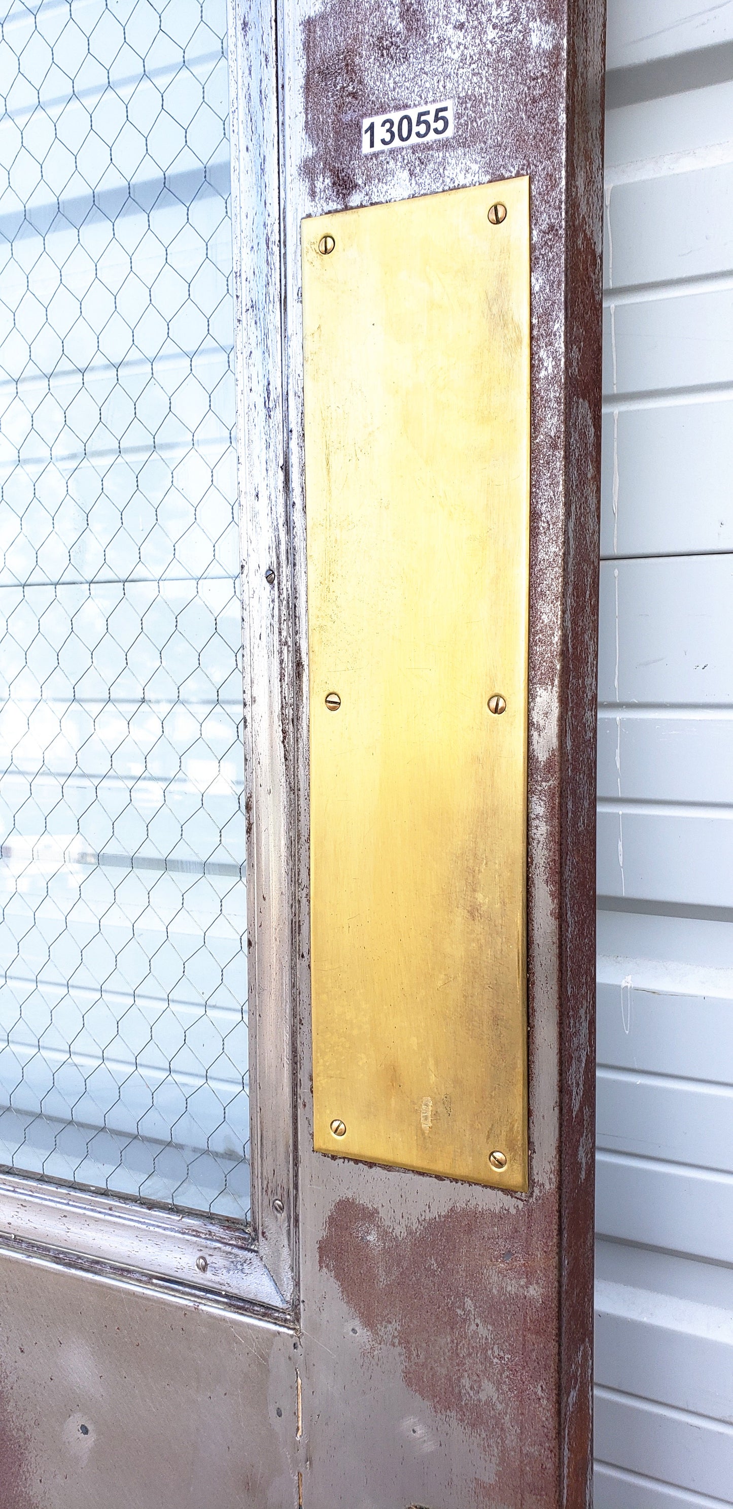 Oversized Single Metal Door with Chicken Wire Glass