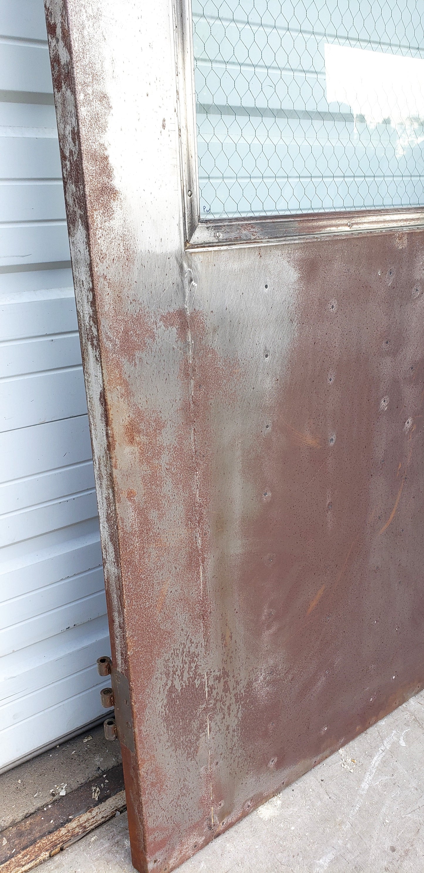 Oversized Single Metal Door with Chicken Wire Glass