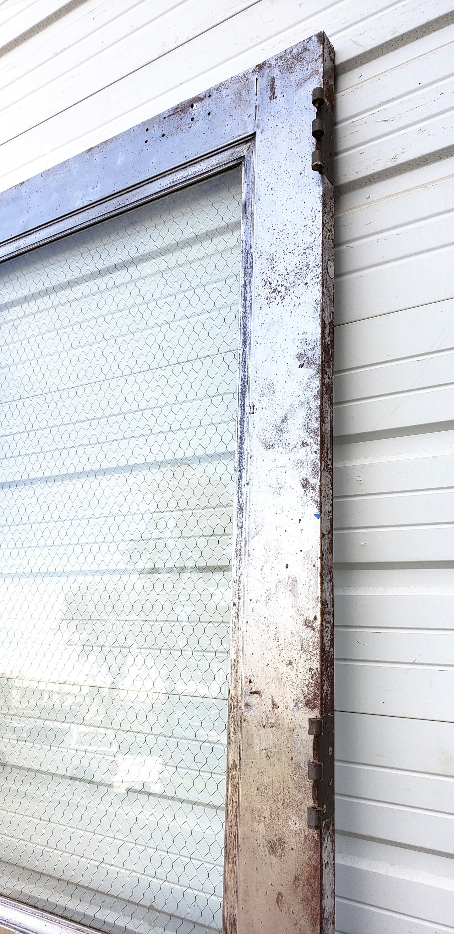 Oversized Single Metal Door with Chicken Wire Glass