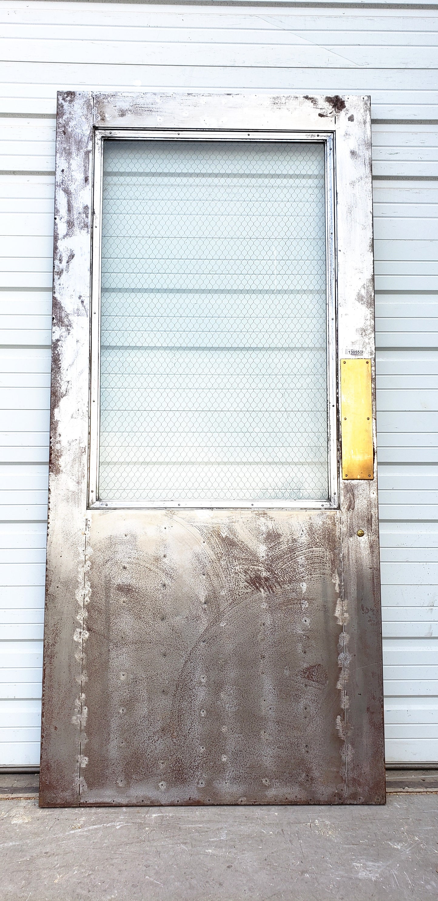 Oversized Single Metal Door with Chicken Wire Glass