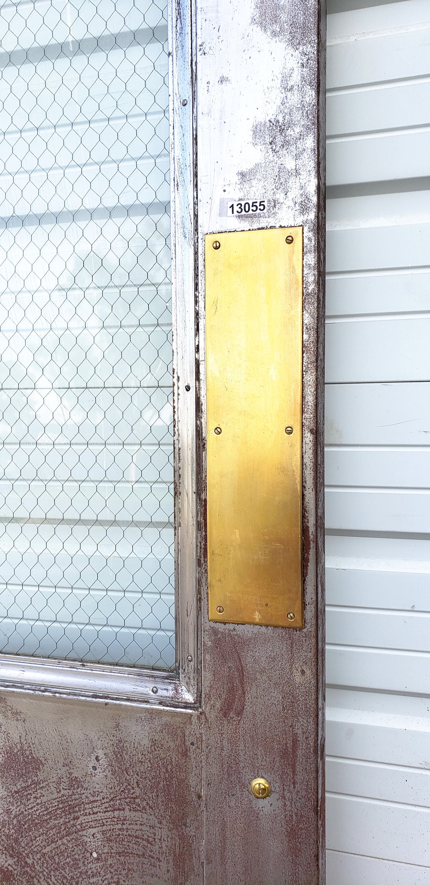 Oversized Single Metal Door with Chicken Wire Glass