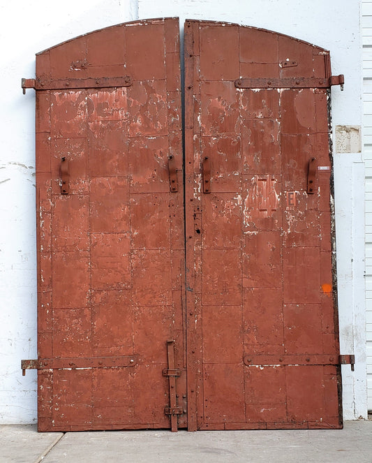 Pair of Reclaimed Arched Metal Fire Doors