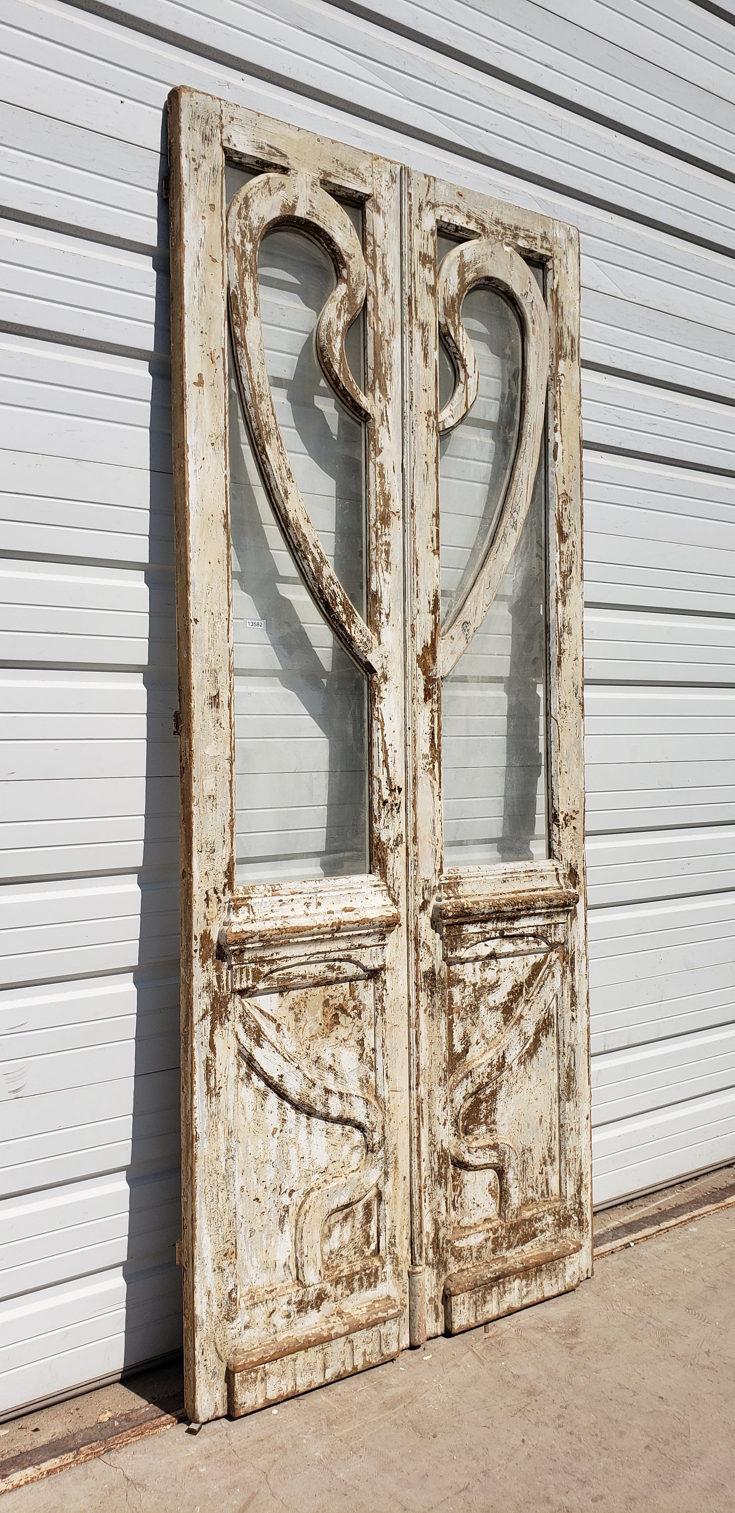 Pair of Painted Wood Multi-Lite Carved Antique Doors