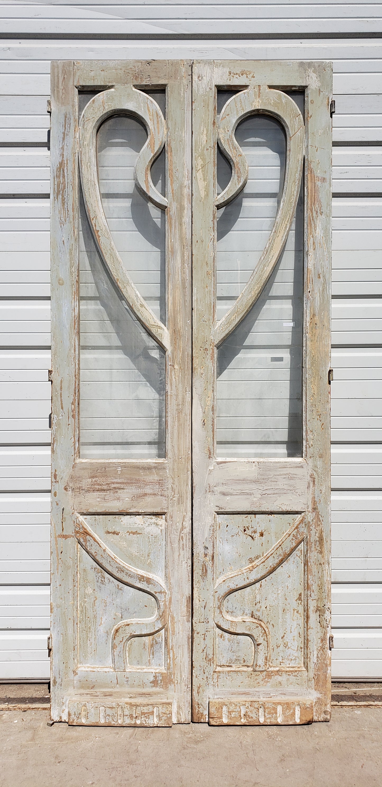 Pair of Painted Wood Multi-Lite Carved Antique Doors
