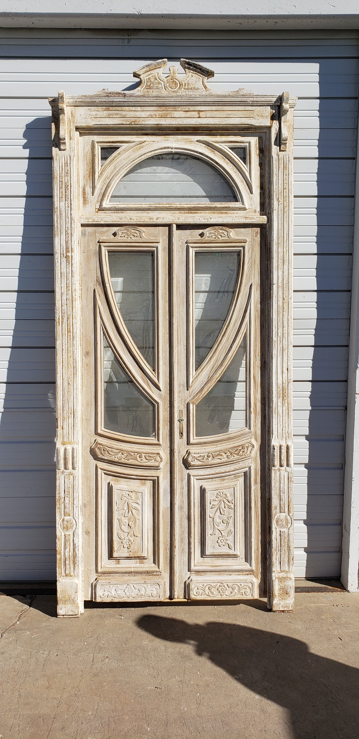 Pair of 2 Lite Antique Painted Doors in Frame with Transom Window