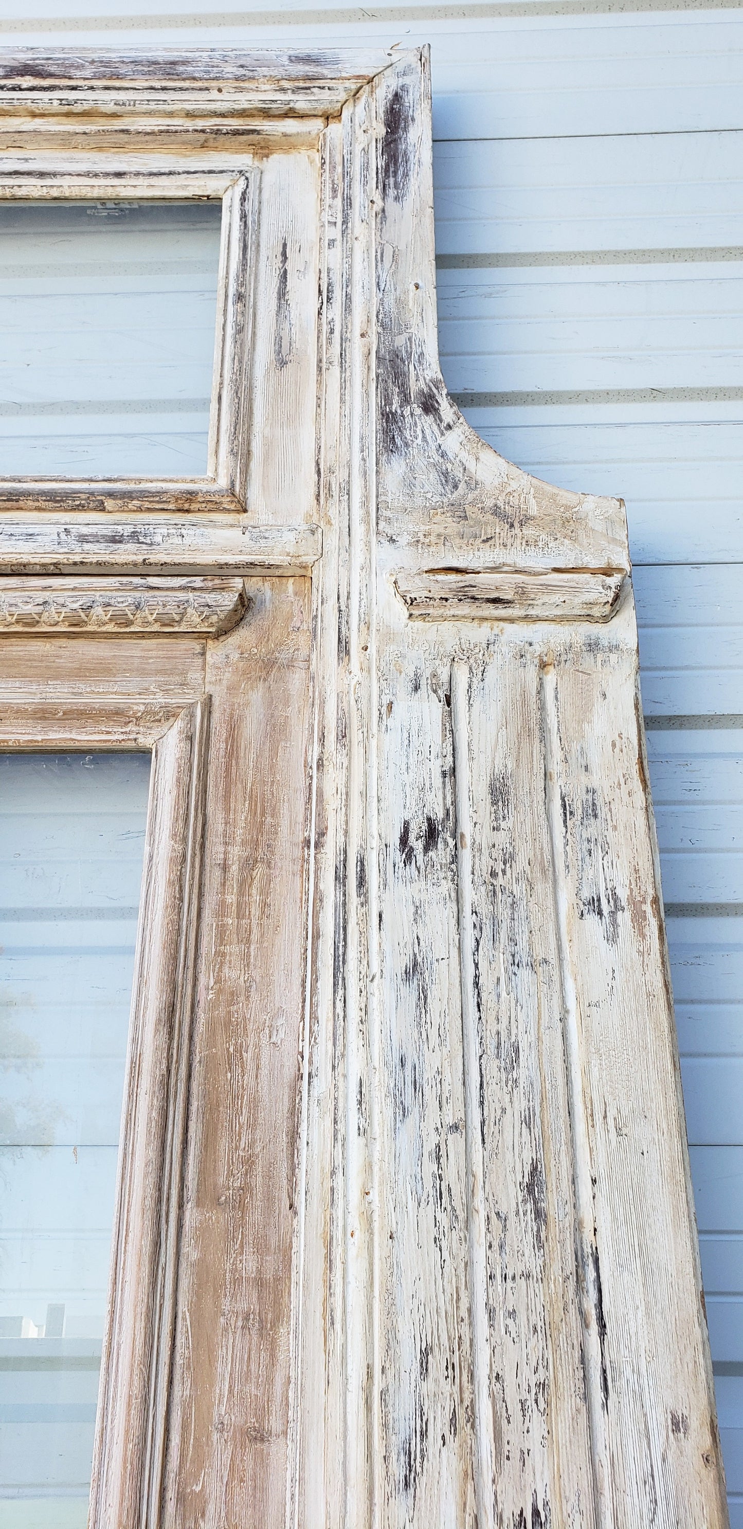 Pair of Washed Antique Wood Single Lite French Carved Doors with Transom Window