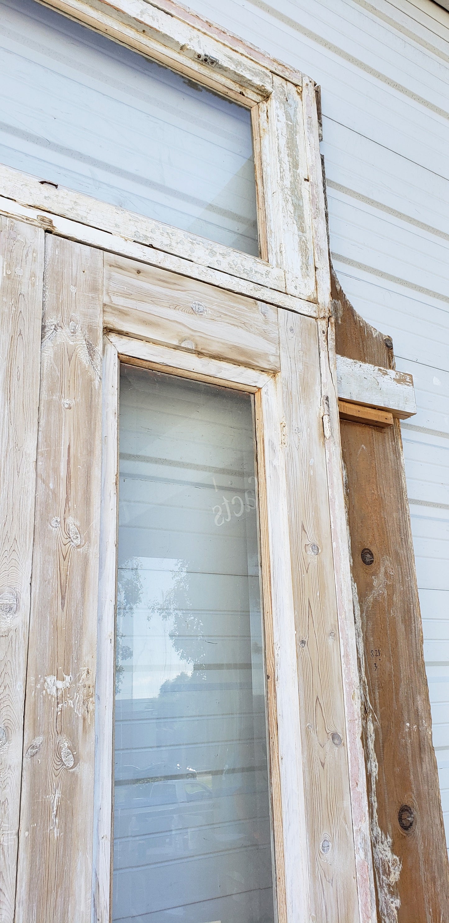 Pair of Washed Antique Wood Single Lite French Carved Doors