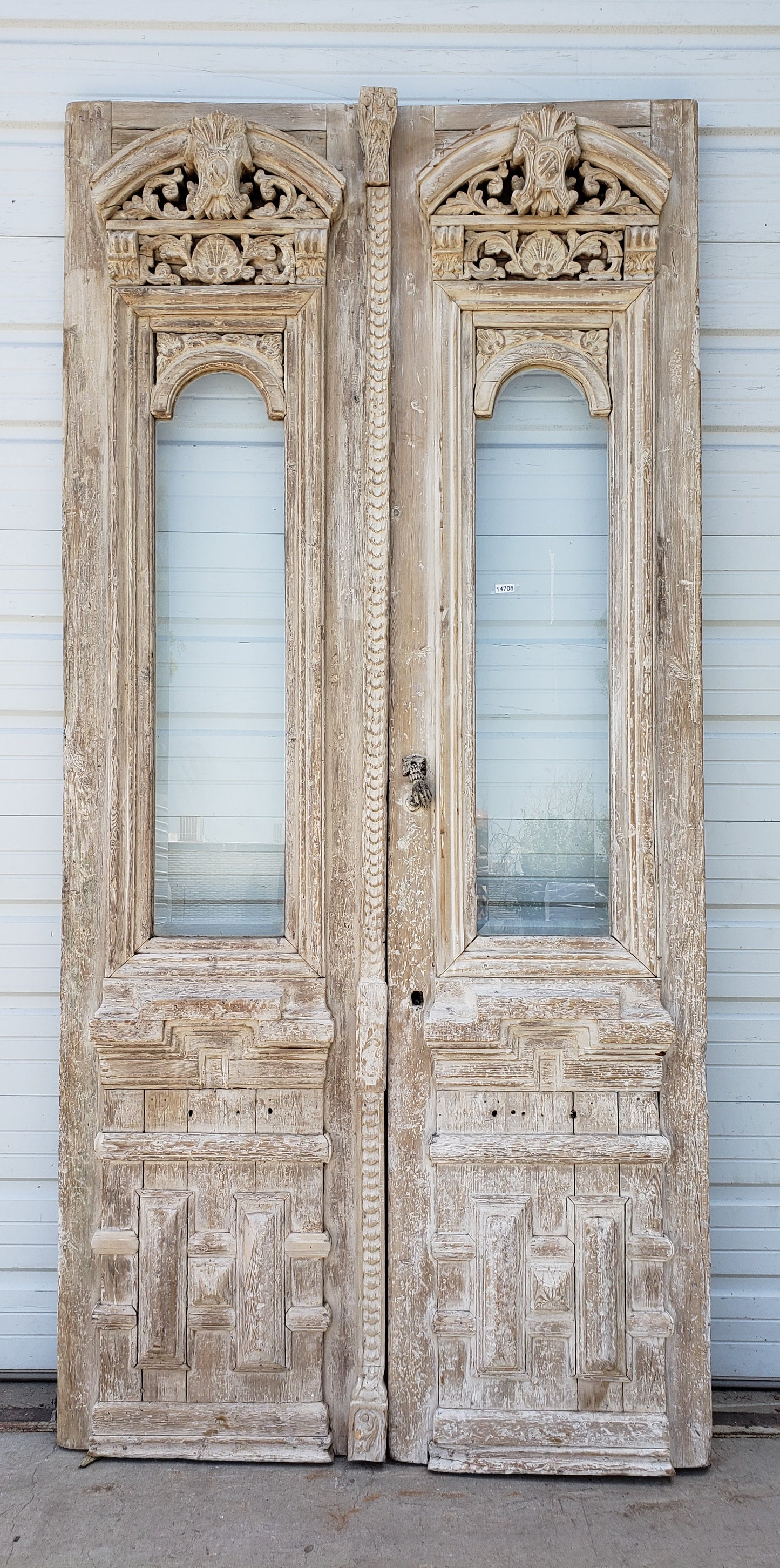 Pair of Single Lite Washed Antique Carved Doors