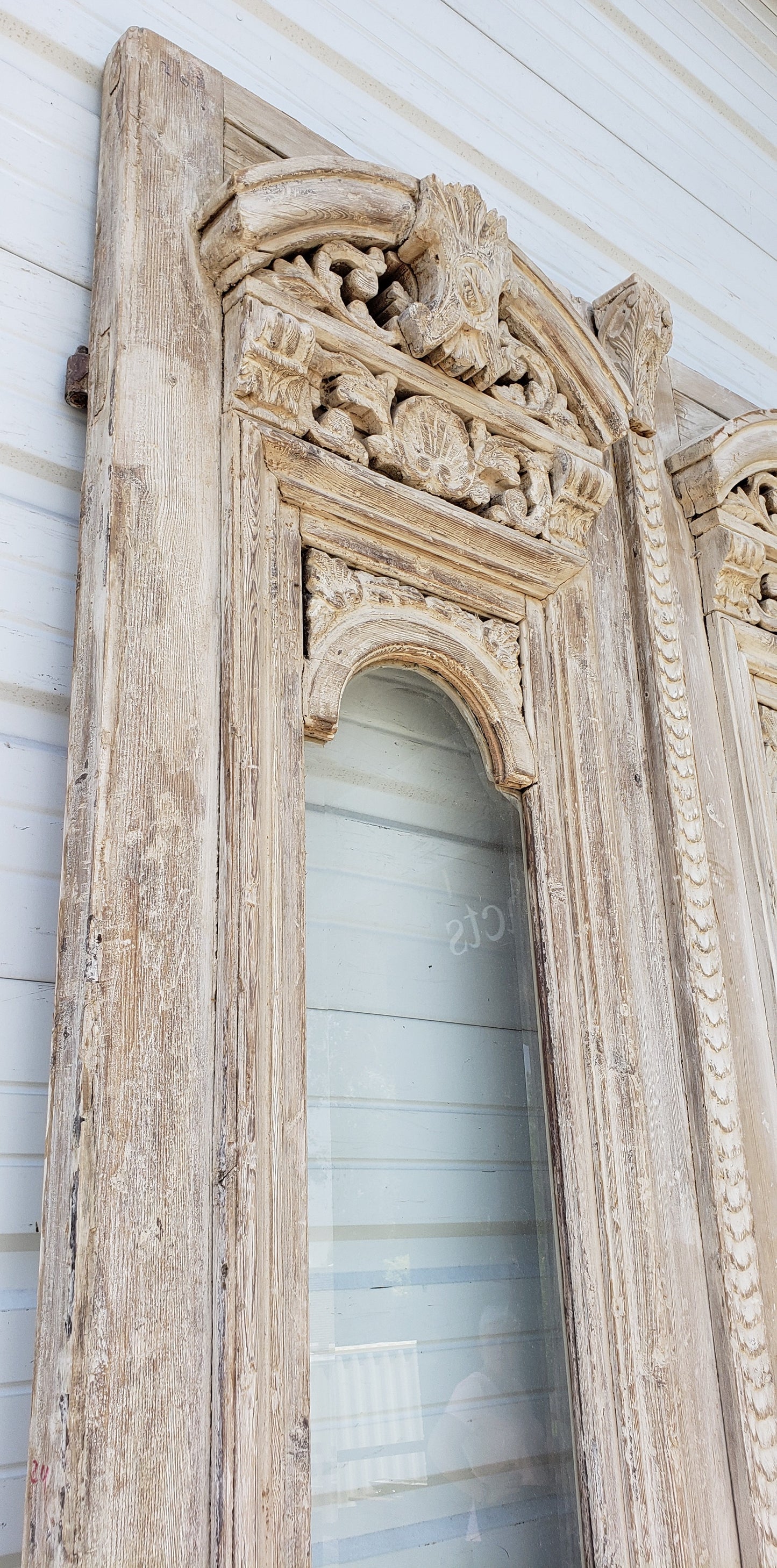 Pair of Single Lite Washed Antique Carved Doors