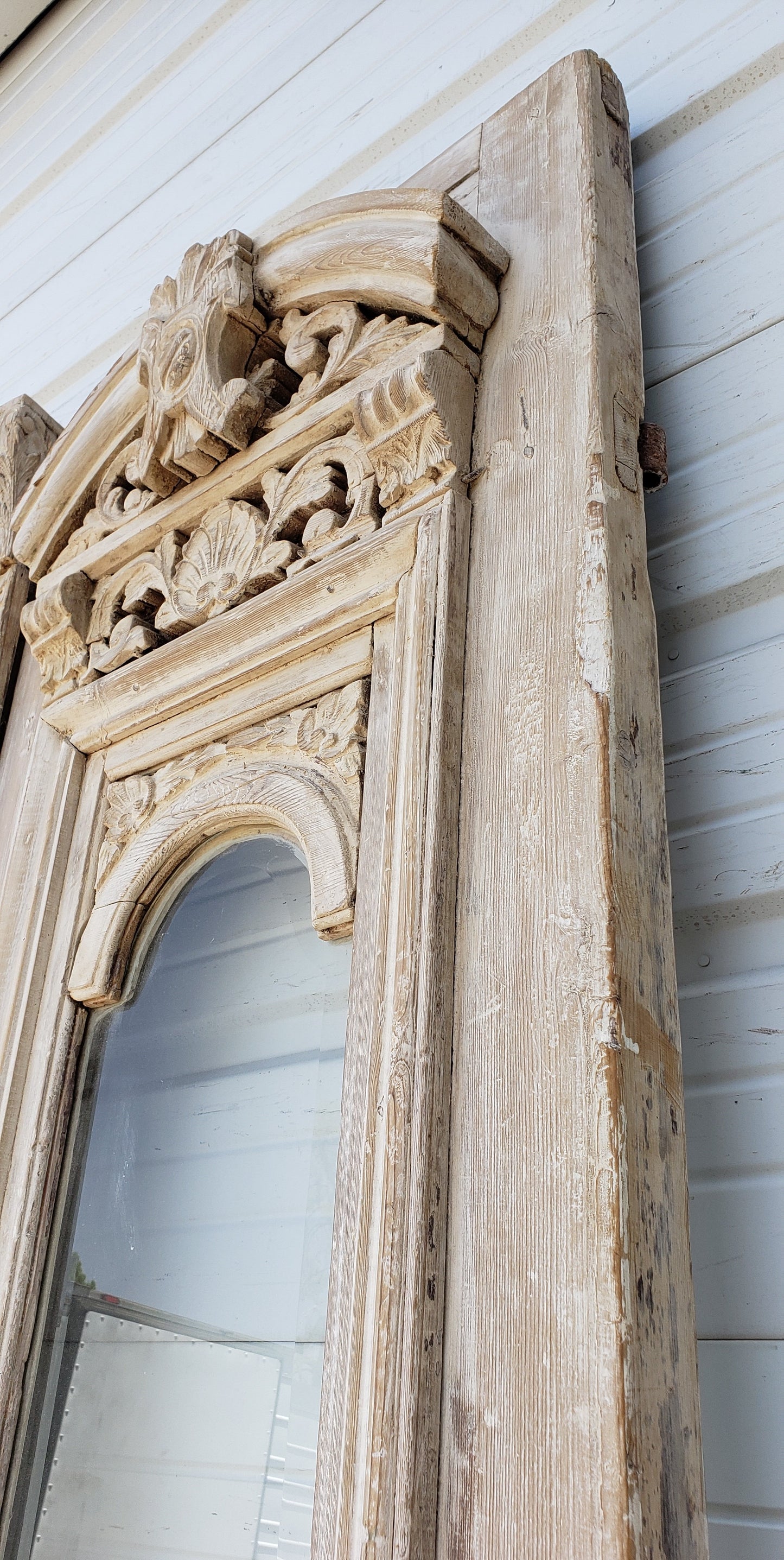 Pair of Single Lite Washed Antique Carved Doors