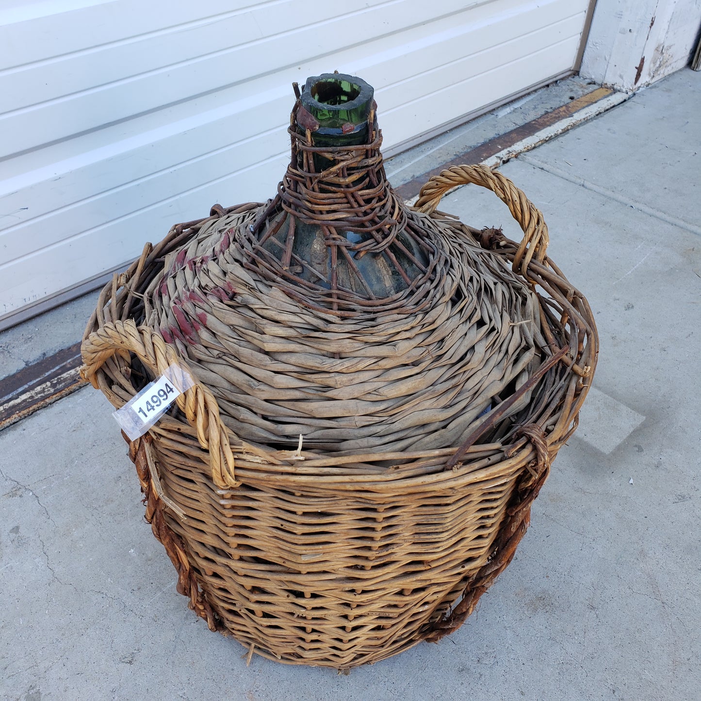 Demijohn in Basket