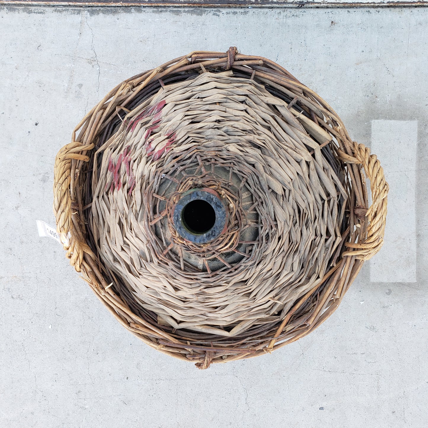 Demijohn in Basket