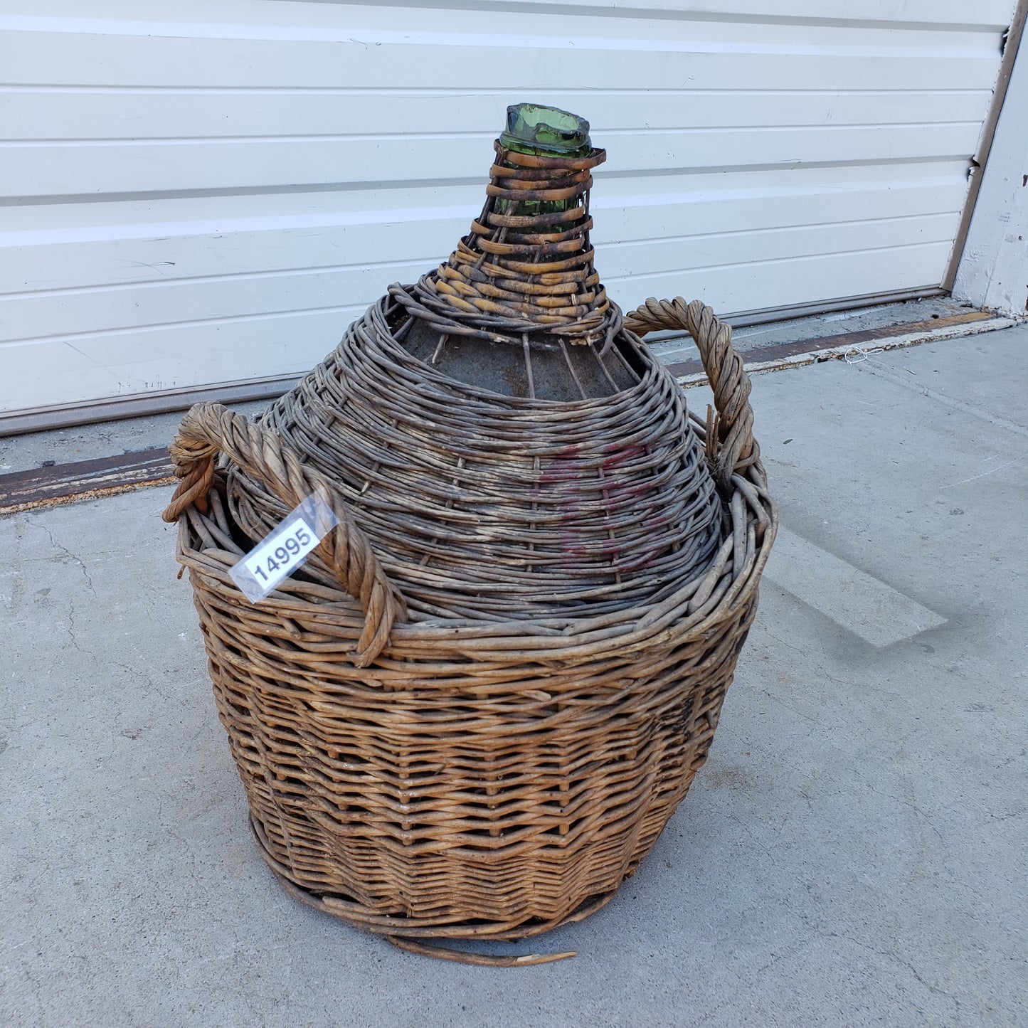 Demijohn in Basket