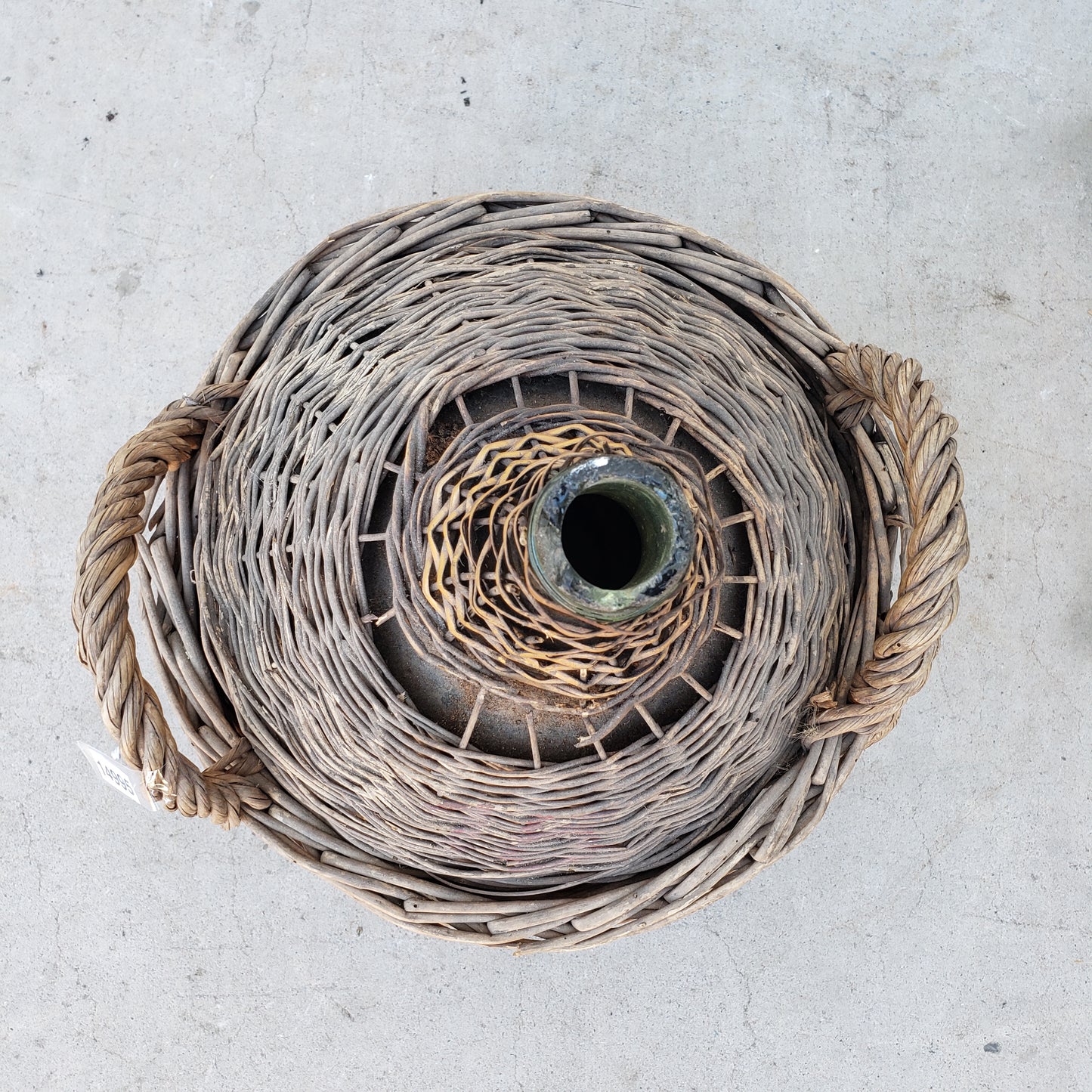 Demijohn in Basket