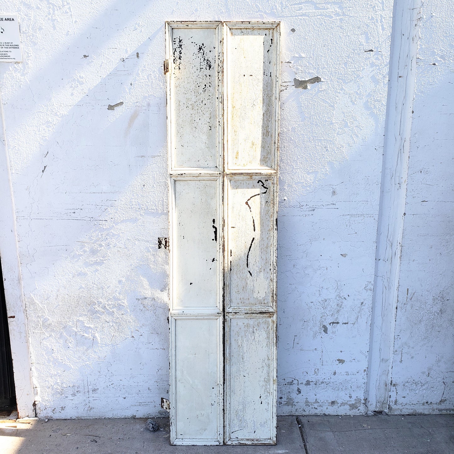 White Metal Bi-fold Shutter