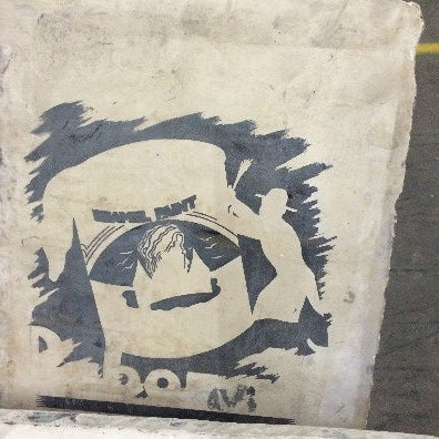 Litho Stone paint can with man next to it