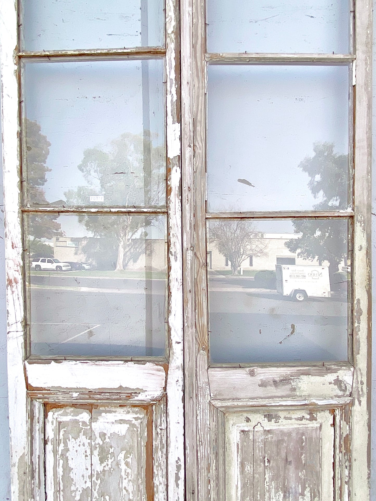 Pair of 4 Lite Stripped Wood French Antique Doors
