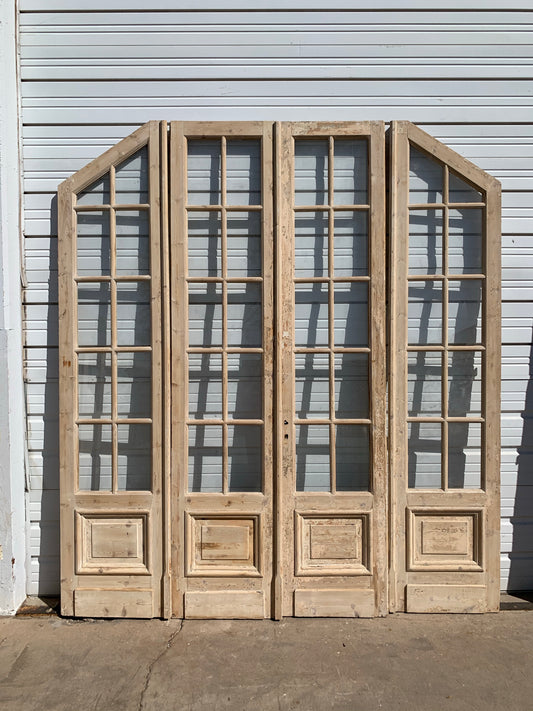Set of Antique Bi-Folding 40 Lite Arched Natural Wood French Doors