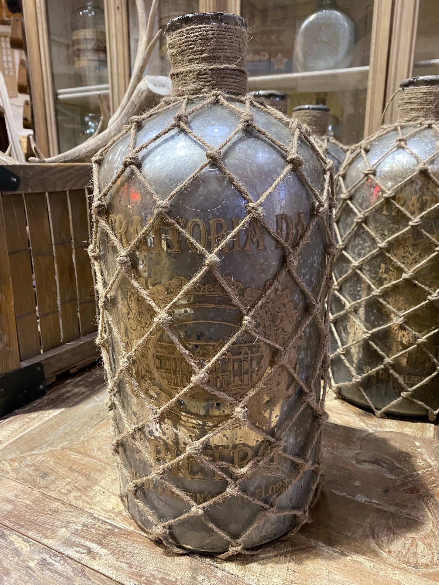 Large Jute Wrapped Silvered Glass Bottle