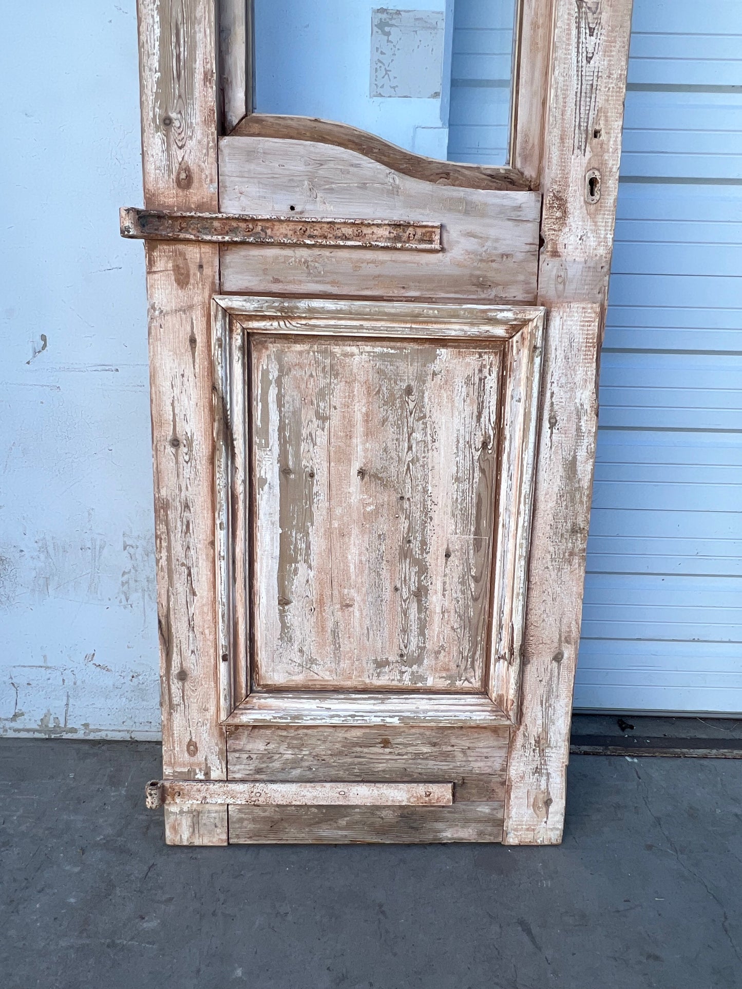 Pair of Washed Antique Wood Arched Single Lite Carved Doors with Raised Panels