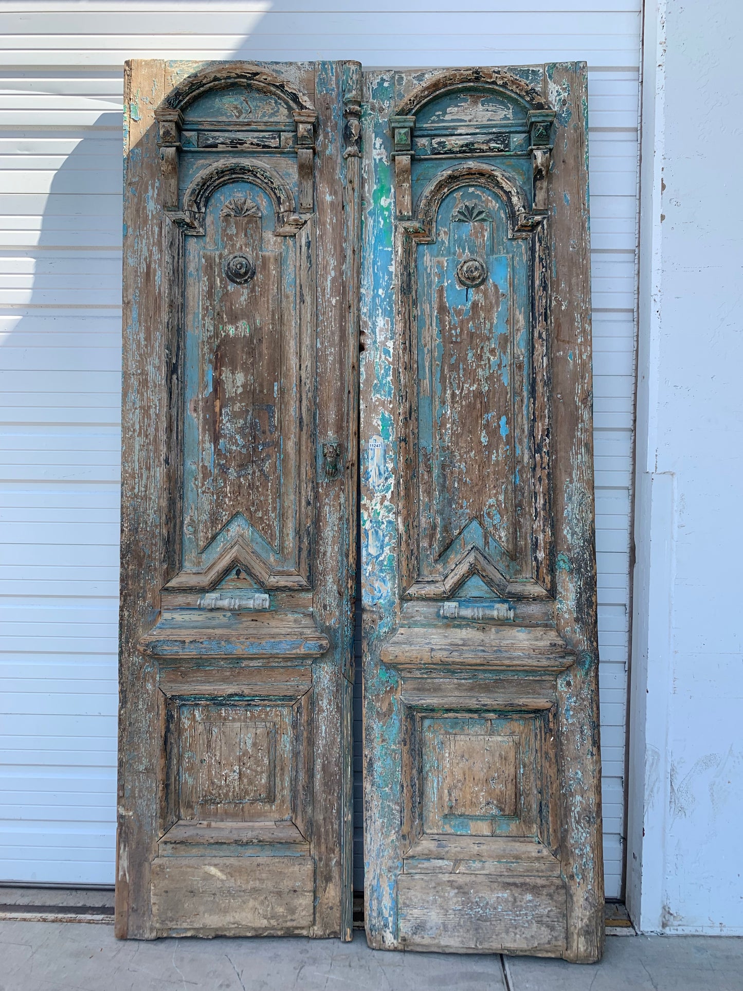 Pair of Ornate Antique Wood Carved Doors