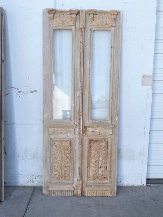 Pair of Antique Carved Doors with Single Glass Lite