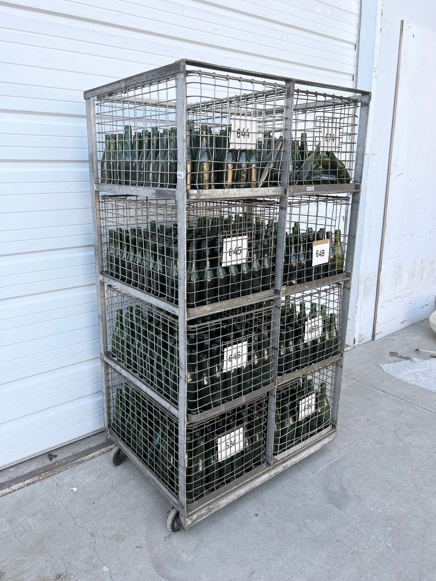 Industrial Iron Rack with 4 Shelves and Beer Bottles (J.R. D'Hollander Brouwerij)