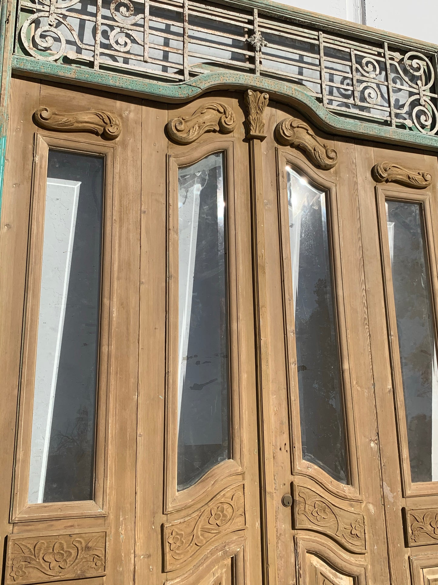 Set of 4 Carved Antique Doors with Iron Scroll Transom