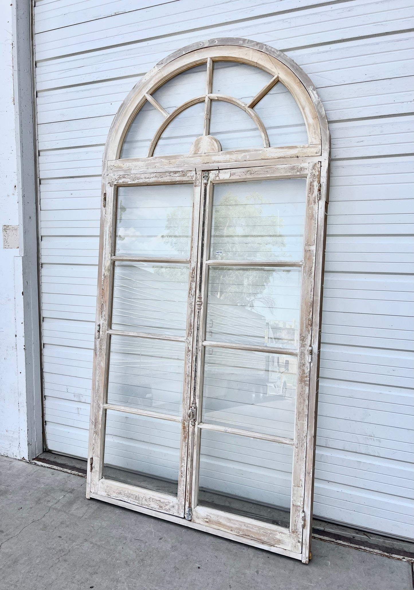 Pair of Washed Windows with w/8 Lites and Arched Transom